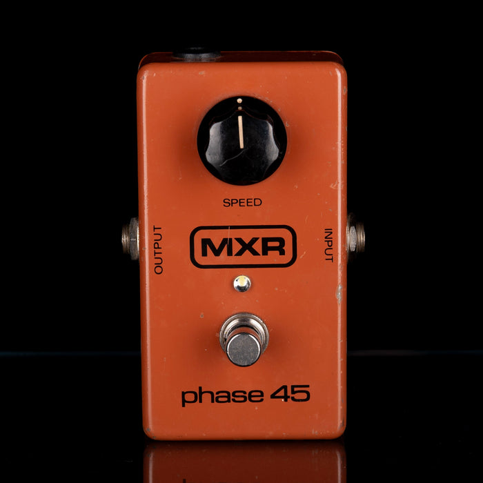 Orange MXR phase 45 guitar effects pedal on a black background
