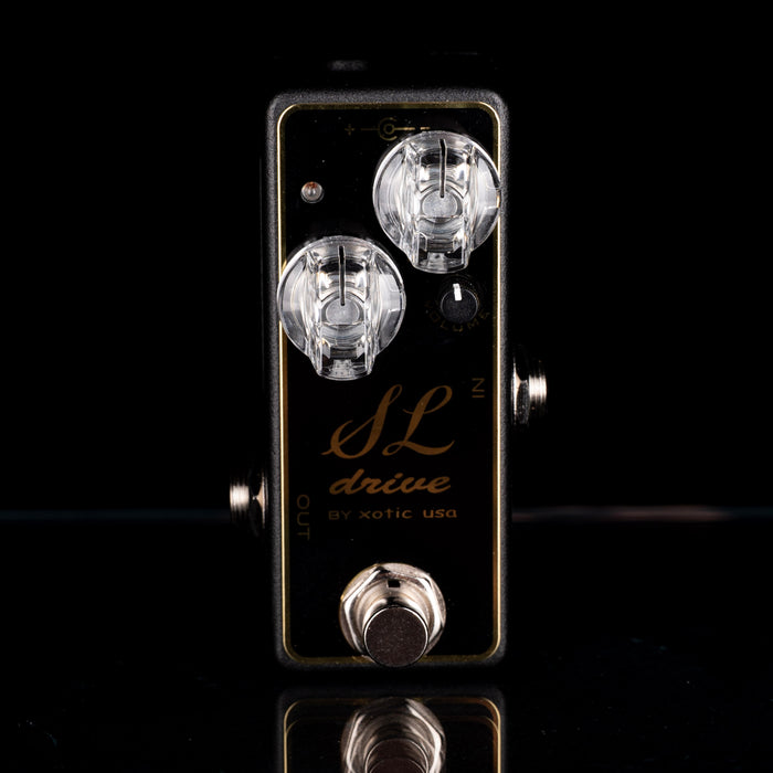 Guitar effects pedal with 'SL drive' branding on a black background