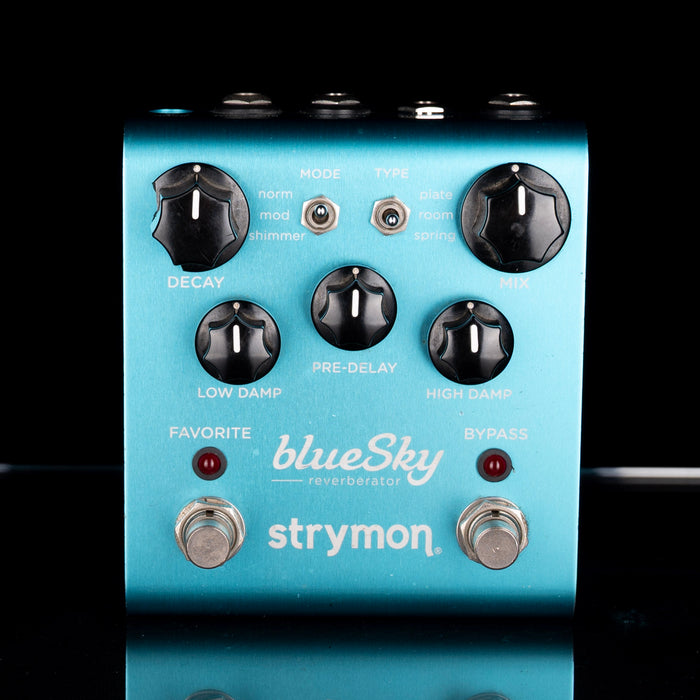 Blue guitar effects pedal with black knobs and Strymon branding on a black background