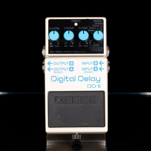 Boss DD-6 digital delay pedal on a black background