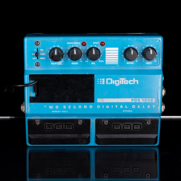Blue DigiTech digital delay effects pedal on a black background