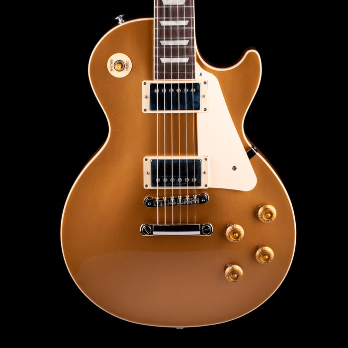 Electric guitar with a sunburst finish on a black background