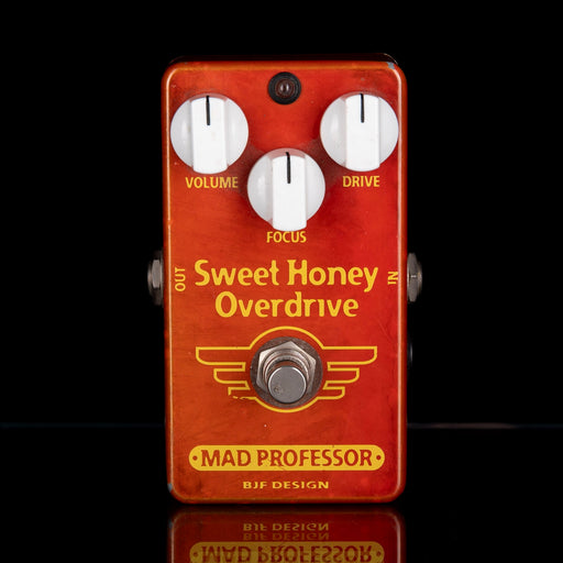 Guitar effects pedal 'Sweet Honey Overdrive' by Mad Professor on a black background