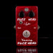 Red Keeley Fuzz Head guitar effects pedal on a black background