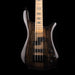 Bass guitar with a dark wood finish on a black background