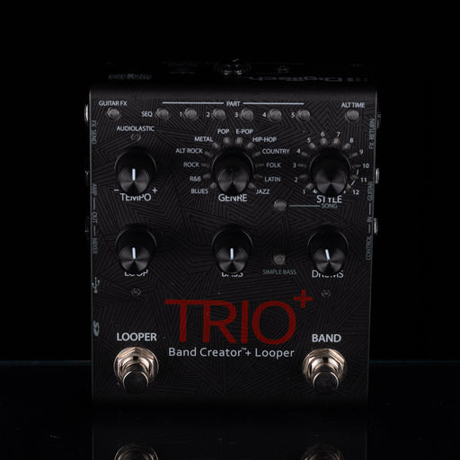 A black Fuzz Face Trio+ Band Creator+ Looper guitar effects pedal with multiple black knobs, red and white text, and silver footswitches, photographed against a black background.