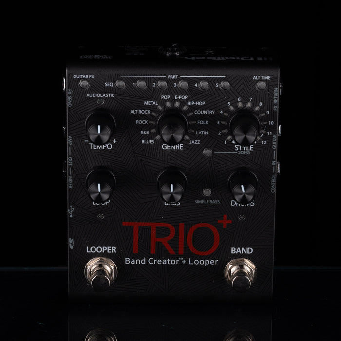 A black Fuzz Face Trio+ Band Creator+ Looper guitar effects pedal with multiple black knobs, red and white text, and silver footswitches, photographed against a black background.
