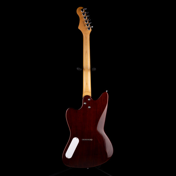 Electric guitar with a dark brown body and light wood neck on a black background