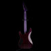 Electric guitar with a dark purple finish on a black background