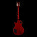 Red electric guitar on a black background