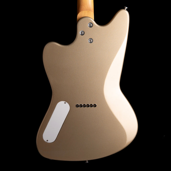 Beige electric guitar body on a black background