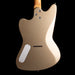 Beige electric guitar body on a black background