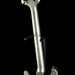 Close-up of a silver electric violin on a black background