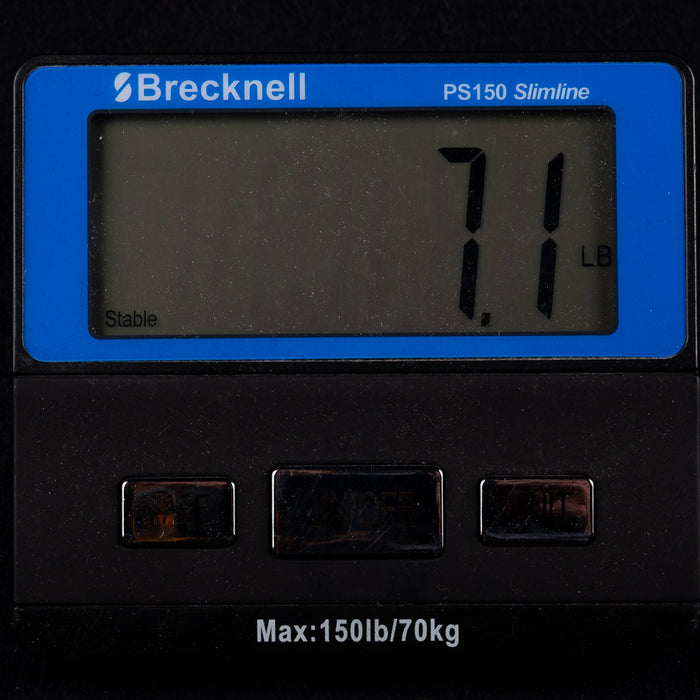 Digital weight display with Brecknell branding showing weight of 71 pounds.