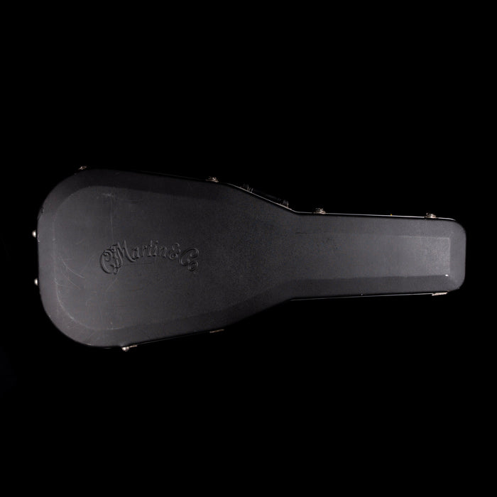 Black guitar case with 'Martin' branding on a white background