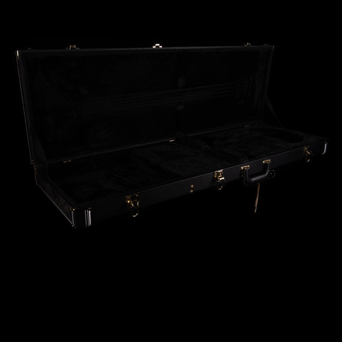 Black open suitcase on a black background