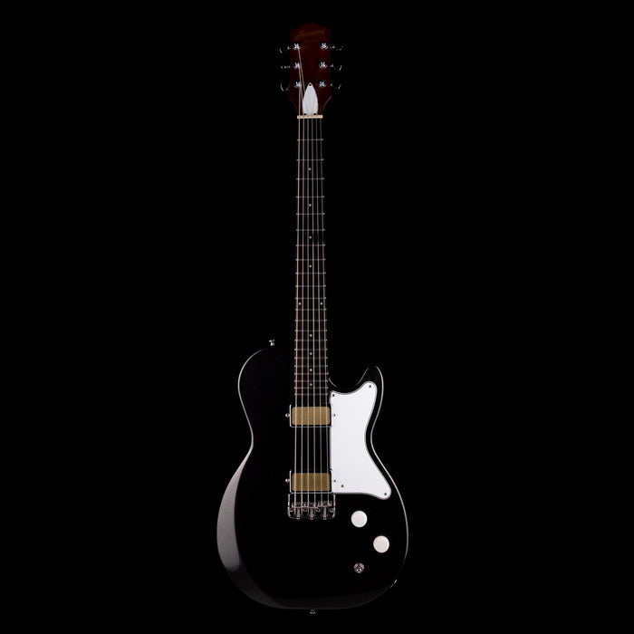 Black electric guitar on a white background