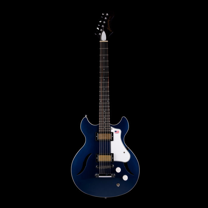 Blue electric guitar on a black background