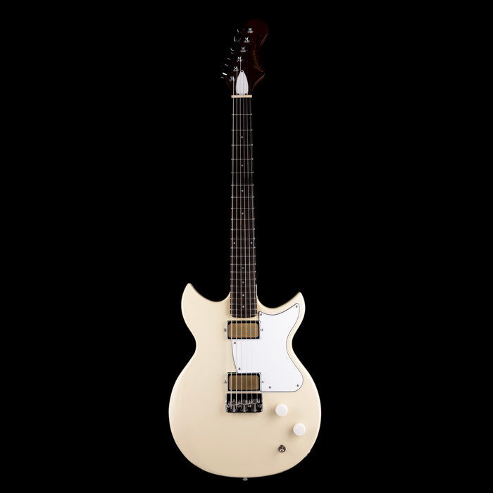 White electric guitar on a black background