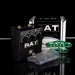 Guitar effects pedal with 'RAT' branding on a reflective surface.