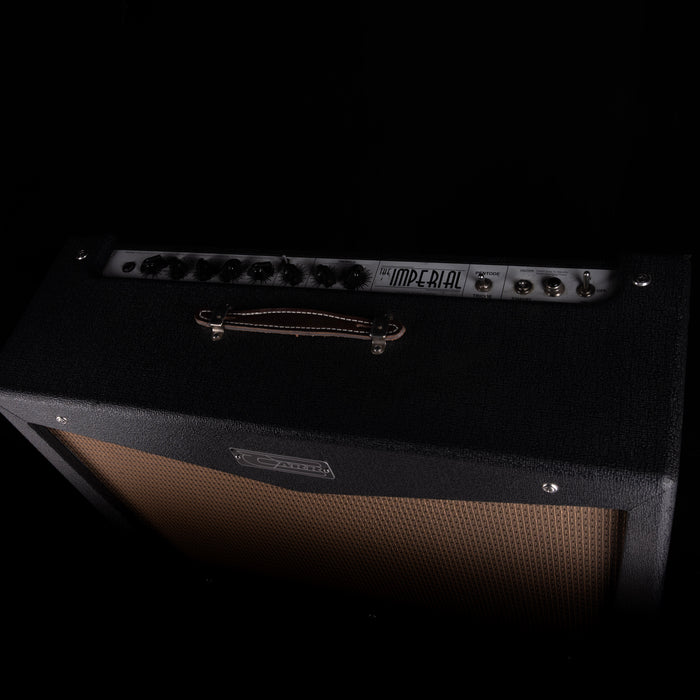 Guitar amplifier with 'Imperial' branding on a black background
