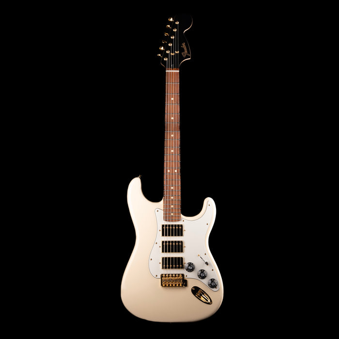 Beige electric guitar on a black background