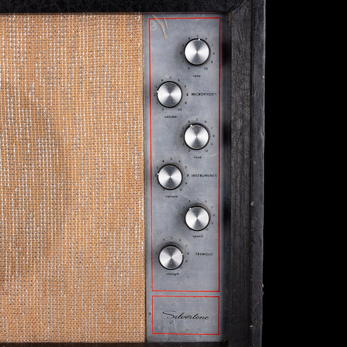 Close-up of a vintage amplifier with control knobs and 'Silverstone' branding.