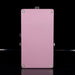 Pink electronic device with metallic screws on a black background