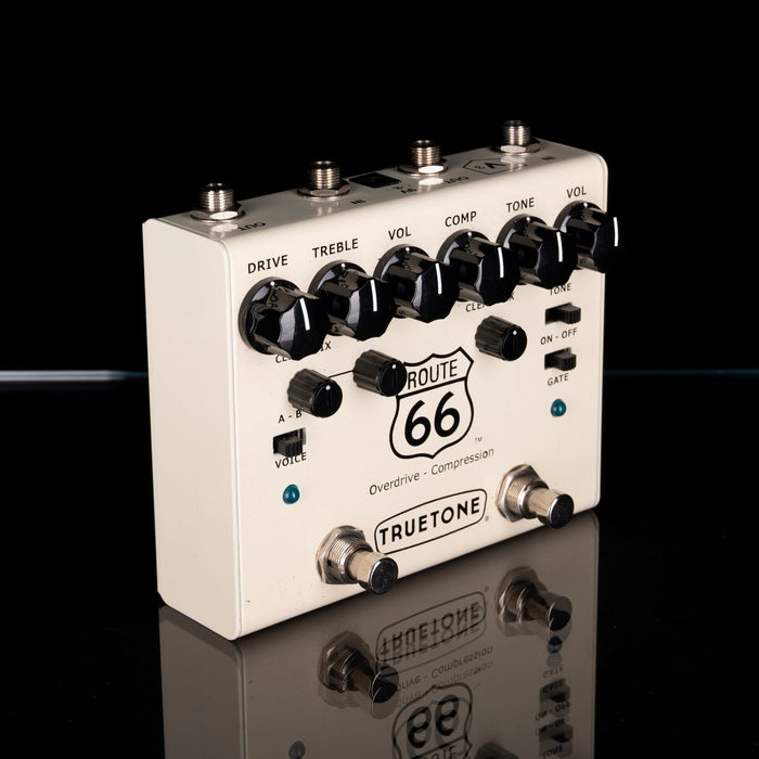 Guitar effects pedal with 'Route 66' and 'TrueTone' branding on a reflective surface.