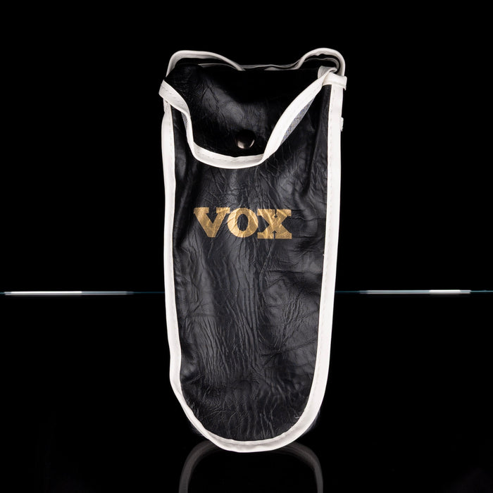 Black and white pouch with 'VOX' branding on a black background