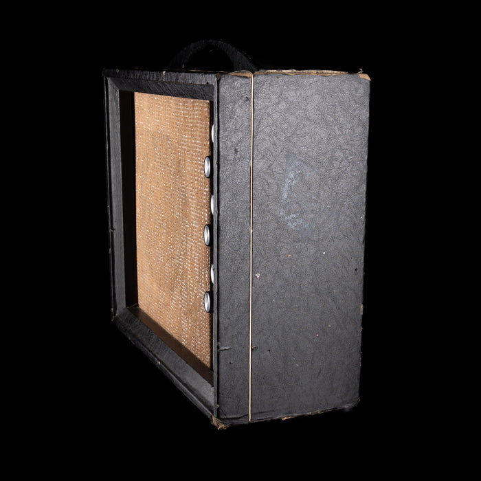 Vintage-style amplifier with a black exterior and brown interior on a white background