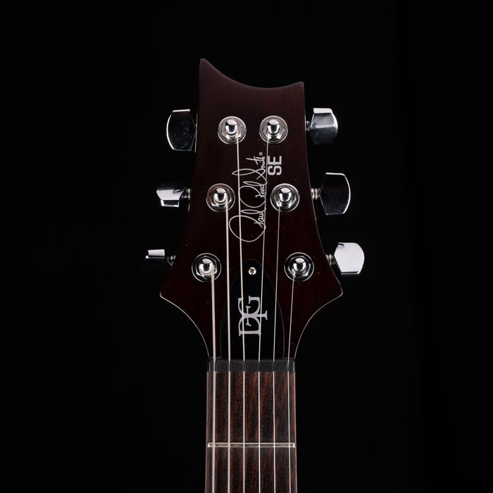 Guitar headstock with brand logo on a black background