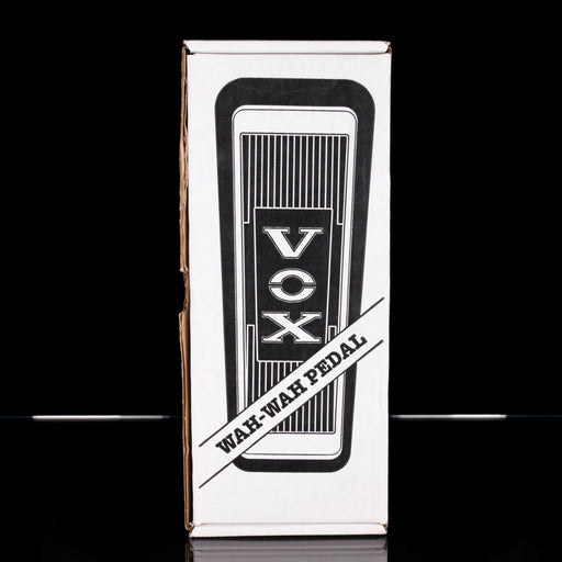 VOX wah-wah pedal packaging on a black background