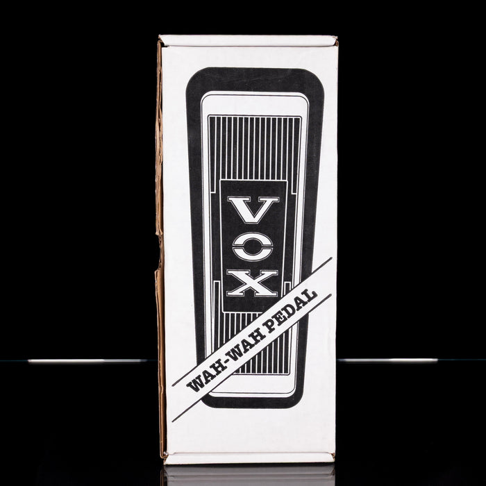 VOX wah-wah pedal packaging on a black background
