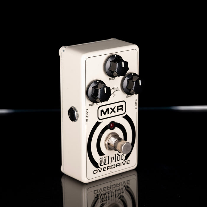 MXR Wilde Overdrive guitar effects pedal on a reflective surface with a black background