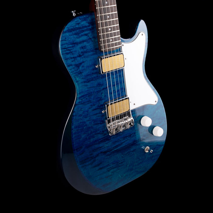 Blue electric guitar on a black background