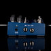 Blue audio interface with various connectors on a black background