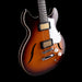 Electric guitar with a sunburst finish on a black background