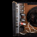 Vintage amplifier with wooden casing and visible wiring on a black background