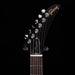 Gibson guitar headstock with brand name on a black background