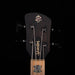 Guitar headstock with 'Spector' branding on a black background