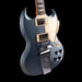 Gibson SG-style electric guitar with a blue finish on a black background