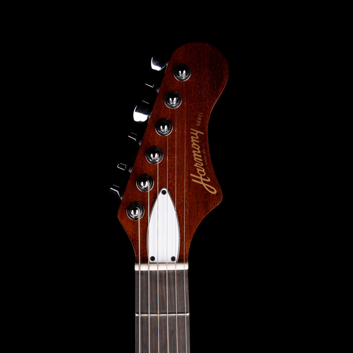 Guitar headstock with 'Fender' branding on a black background