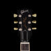 Gibson Les Paul guitar headstock on a black background