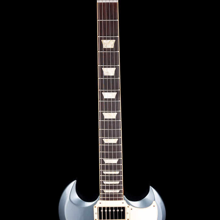 Guitar neck with a black and white design on a black background