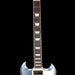 Guitar neck with a black and white design on a black background