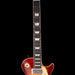 Electric guitar with a sunburst finish on a black background