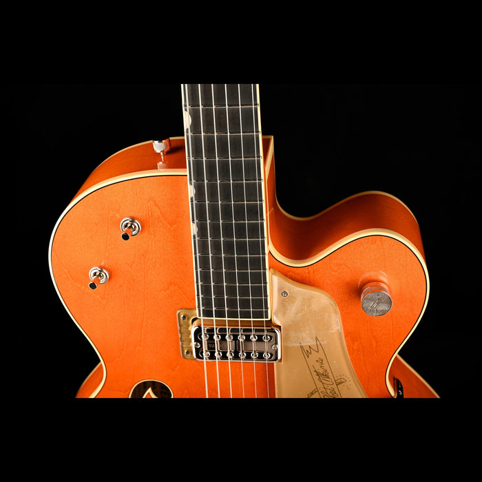 Gretsch G6120T-59 Vintage Select '59 Chet Atkins Hollow Body Lacquer Vintage Orange Stain Closeup Top Bout Angle Down