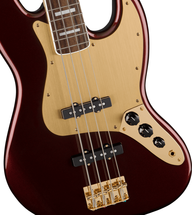 Squier 40th Anniversary Jazz Bass®, Gold Edition, Laurel Fingerboard, Gold Anodized Pickguard, Ruby Red Metallic Bass Guitars